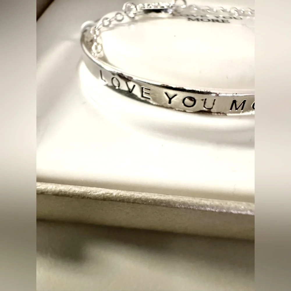 NWT silver plated bracelet w/attached charm, coach charm, & leather purse charm - Picture 6 of 16
